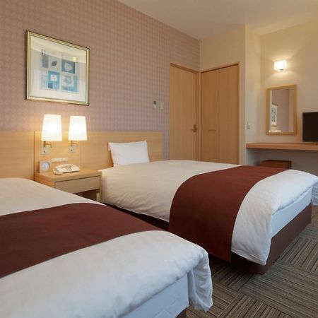 โรงแรมคะนะซะวะ โตกิว คานาซาว่า ภายนอก รูปภาพ A typical room at the hotel